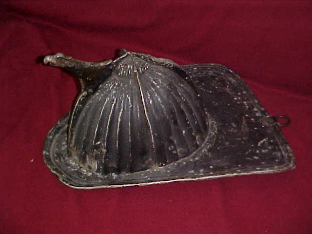 Metal Fire Helmet. Good condition with partial lin