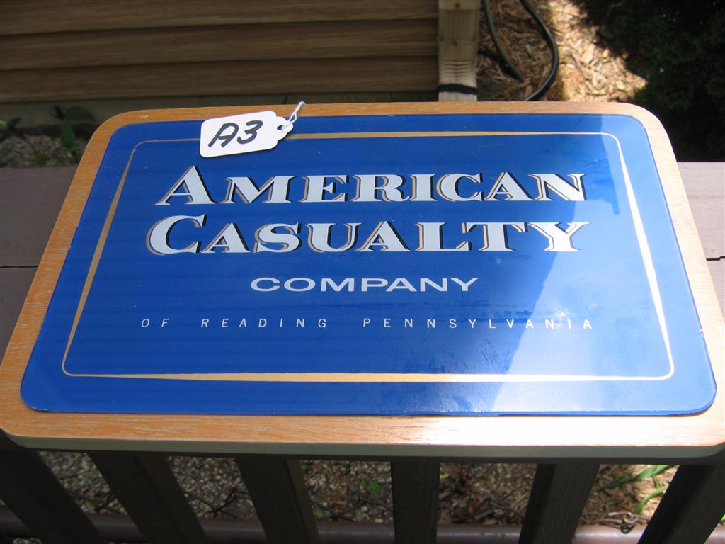 Sign. American Casualty Company. Wood with white