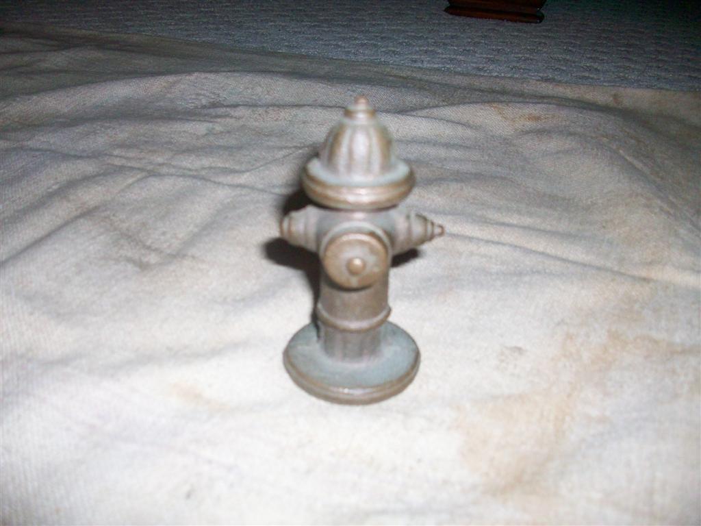 3.5 inch cast metal fire hydrant paperweight. It i