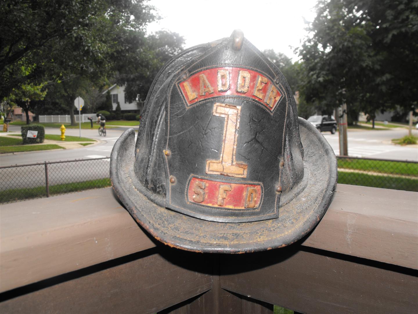 Fire Helmet - Old. Ladder 1 S.F.D. Inside has me