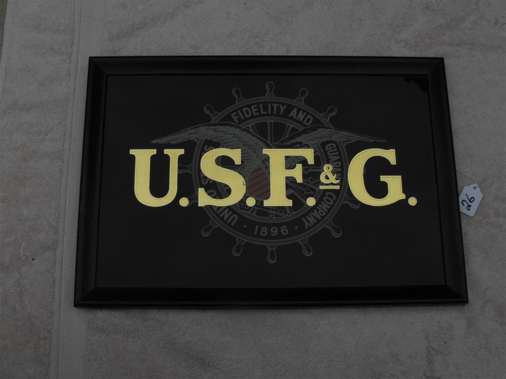 USF&G Sign. Reverse Glass. Black background with