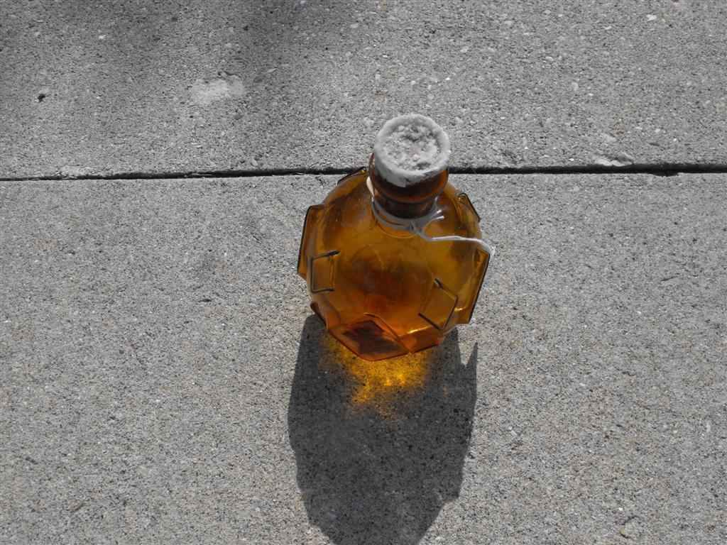 Gold Glass Grenade. HSN etched in glass. Half Ful