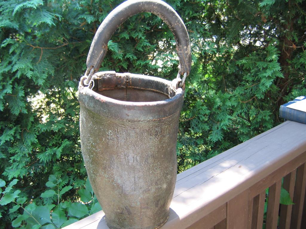 Old Fire Bucket. Almost all stenciling is gone.