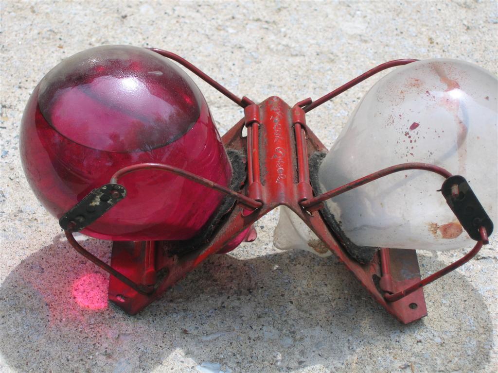 Duel Glass Grenades - one red (with liquid), one w