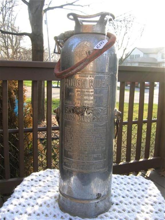 Fire Extinguisher. Metal. 23 1/2 tall. Rough Ri