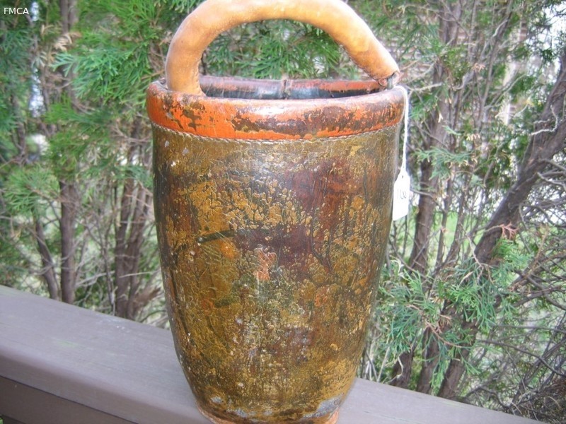 Fire Bucket. Leather is in good condition except