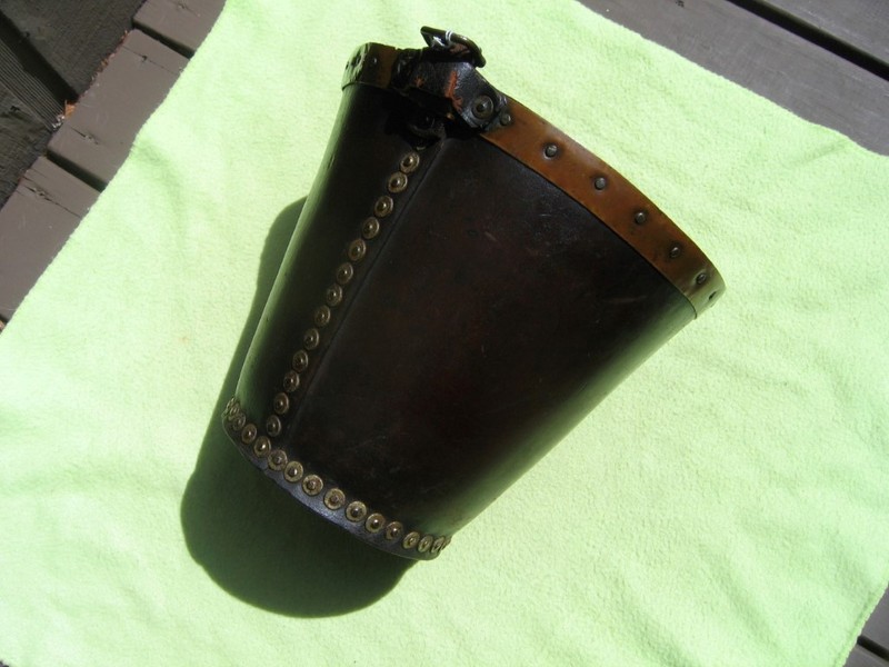Leather Fire Bucket. Metal at top with stamping o
