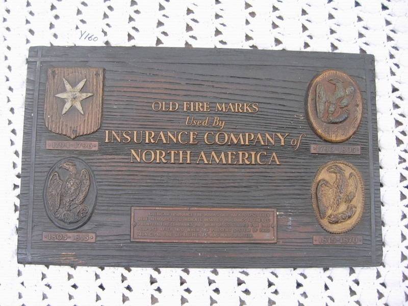 Old Fire Marks Used by Insurance Company of North