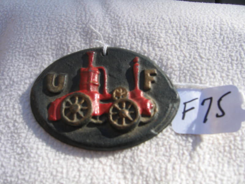 Miniature Fire Mark. Metal 3 1/2x2 1/2.