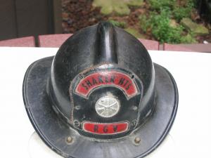 #209 Fireman’s Helmet from Shaker Heights with Helmet Shield on front.