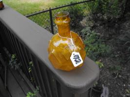 Glass Grenade. Amber. Diamonds. "HNS" in script