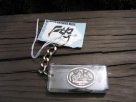 Key Chain. Lucite with replica firemark inside.