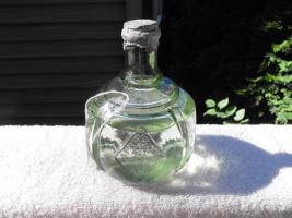 Light Green Glass Grenade. 3/4 full. Haywards Ha