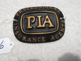 PIA - Professional Insurance Agency Paperweight.