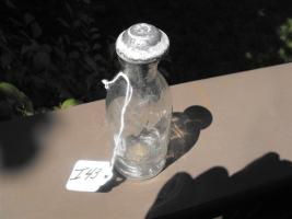 Acid Bottle. Clear bottle 5" high with original m