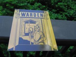 Sign. Warden. Heavy Tin. Mostly Gold background