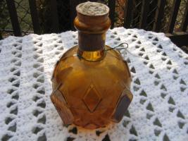 Amber HNS Grenade. One half full. 7 inches tall.