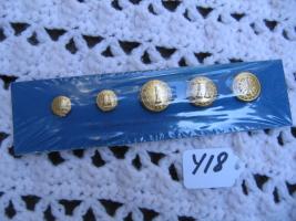 Buttons. Gold Color. Each Button has Raised Lett