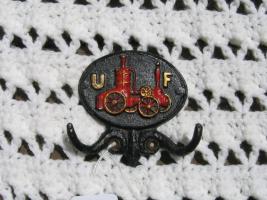 Cast Iron "towel" Holder with United Fireman's Rep