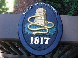 Reliance Insurance Company Plaque. Hard Plastic.