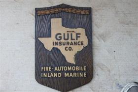 Gulf Insurance Co Plaque. Pressed Wood.