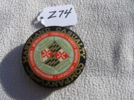 Maryland Casualty Company Advertising Paperweight.