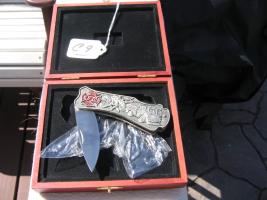 Knife. Silver. On both sides is Fire Department
